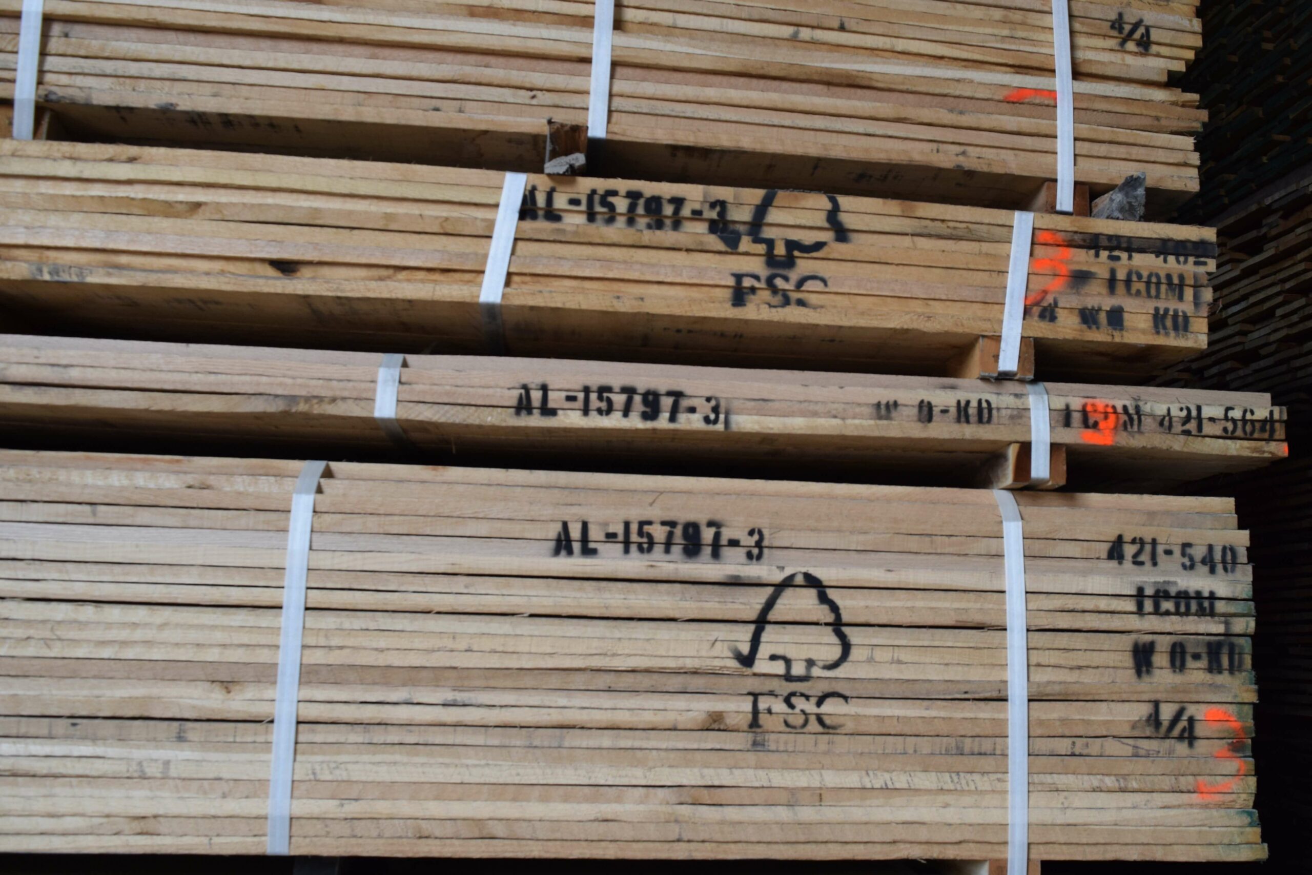 Stacks of lumber with the FSC Certified logo on them